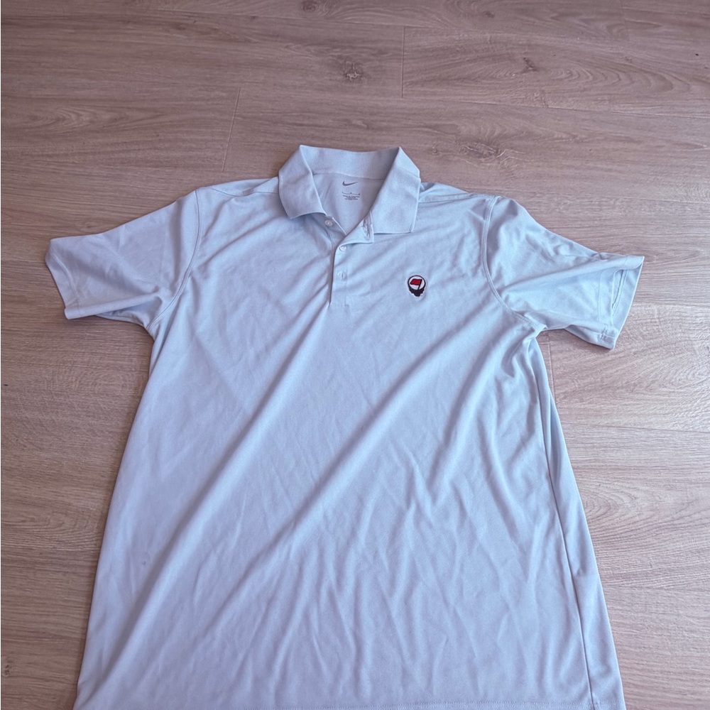 Nike White Polo Shirt with Small Red & Black Chest Patch